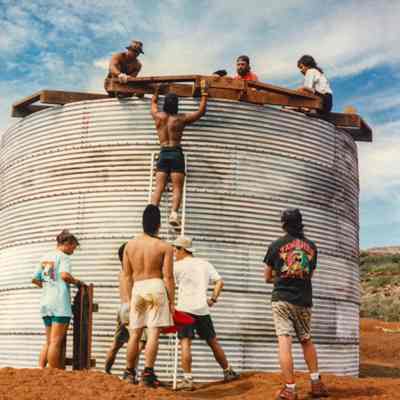 People working on water catchment