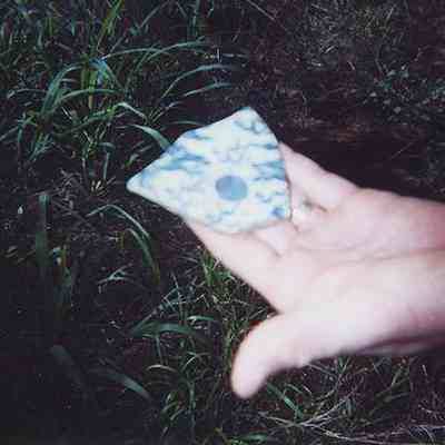 Piece of china held in a hand