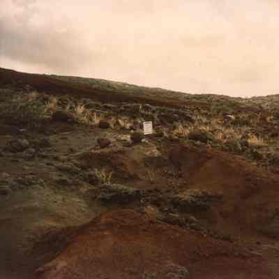 Hardpan terrain with sign