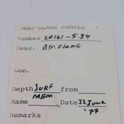 Artifact slip for basaltic glass flake: The image shows an artifact slip labeled "Kaho'olawe Sample," dated June 22, 1977, with details about depth and description