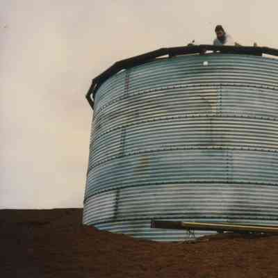 Dan Holmes on top of water tank