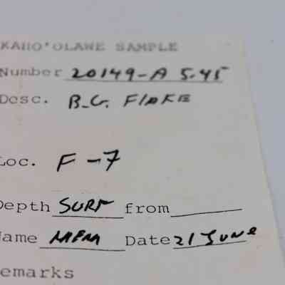 Artifact slip for basaltic glass flake: The image shows an artifact slip labeled "Kaho'olawe Sample" with number, description, location, and date details handwritten.