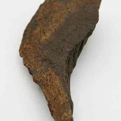 Lengthwise close up view of basalt needle/gouge: Original size: 9 cm; Original format: Artifact; Resolution: 150 dpi
