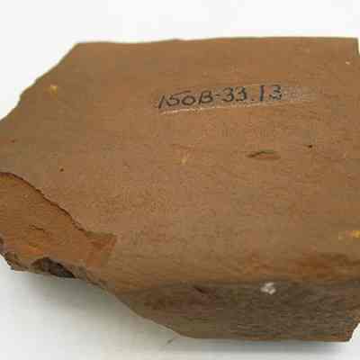 Basalt adze fragment with alternate id number visible: Origsize: 6.84 cm (l); Origformat: Artifact; Resolution: 200 dpi