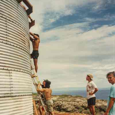 People working on water catchment