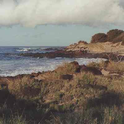 Unidentified shoreline with beach