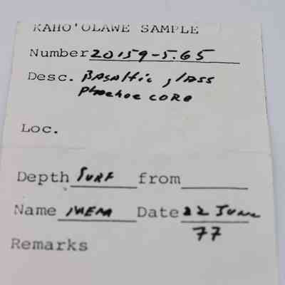Artifact slip for basaltic glass core: The image shows a Kaho'olawe sample form with details about a basaltic glass pāhoehoe core, dated June 22, 1977.