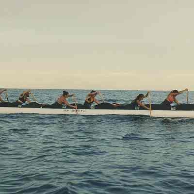Women paddling canoe