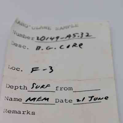 Artifact slip for basaltic glass core: An artifact slip shows details like number, description, location, depth, name, and date, filled with handwritten notes.