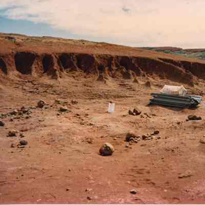 Hardpan terrain with construction materials