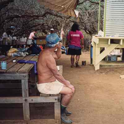People working around camp