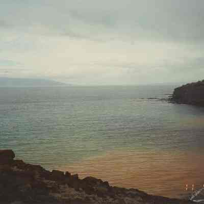 Kaulana Bay's silted water