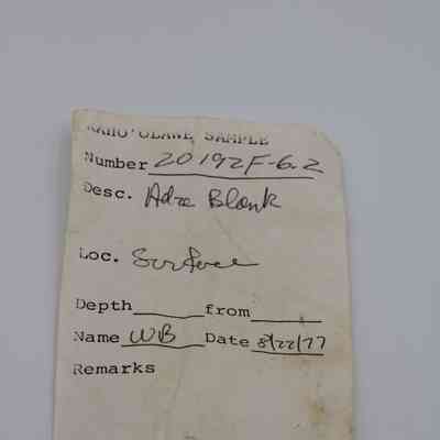 Artifact slip for adze blank: The image shows an artifact slip with details like number, description, location, date, and name, written in a handwritten style.