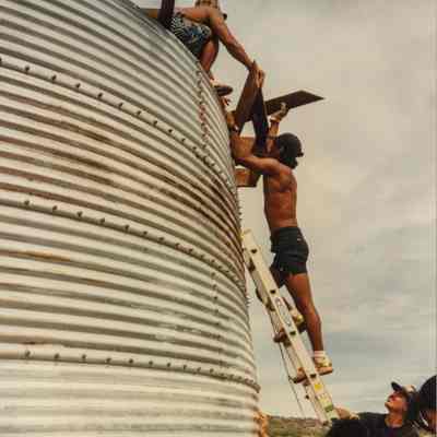 Men working on a water catchment structure