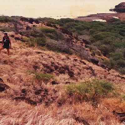 Men standing on rocks
