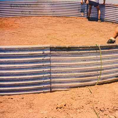 Base of a metal water catchment structure