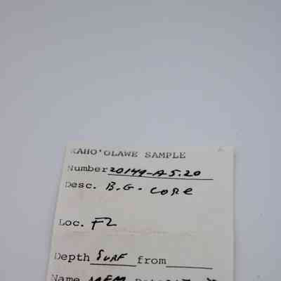 Artifact slip for basaltic glass core: The image shows an artifact slip labeled "Kaho'olawe Sample" with details such as number, description, location, depth, name.