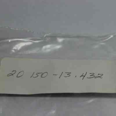 Artifact bag label for an awl: A transparent plastic bag contains a handwritten label with the number "20 150-13.432" visible on it.