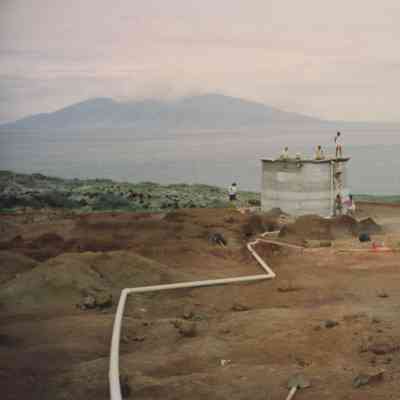 People working on water tank