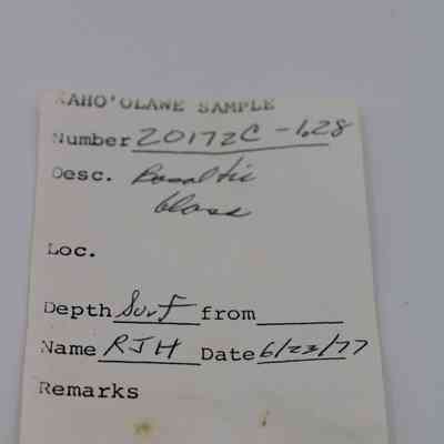 Artifact slip for basaltic glass piece: The image shows an artifact slip labeled "Kaho'olawe Sample" with details like number, description, and date.