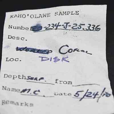 Artifact slip for coral disk: The image shows a sample label from Kaho'olawe, including details like sample number, description, location, collection depth, and collector initials.