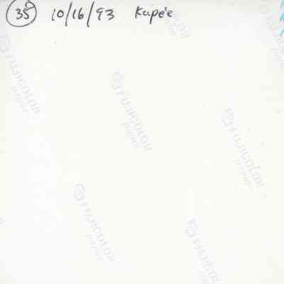 Back of photograph (KIRC Object ID #2013.019.529): The image shows the back of a photograph with handwritten notes, including a date, a name, and numerical codes, printed on FujiColor paper.