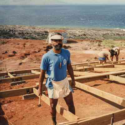 Man standing in wooden frame