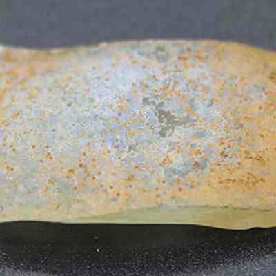 Closeup of glass bottle fragment: Origformat: Artifact; Resolution: 200 dpi