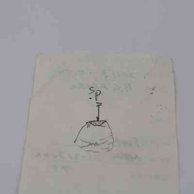 Back of artifact slip for a basaltic glass core: The image shows a paper slip featuring a hand-drawn illustration of an artifact, with "S.P." handwritten on it.