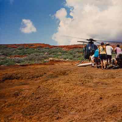 People helping to unload cargo