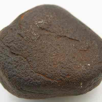 Close up of triangular basalt hammerstone: Origsize: 6.62 cm (l); Origformat: Artifact; Resolution: 200 dpi