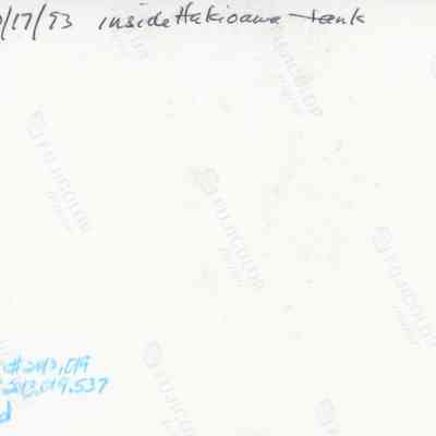 Back of photograph (KIRC Object ID #2013.019.537): The image shows handwritten text with a date, "10/17/53," and the words "inside Hakoawa tank" on Fujicolor paper.