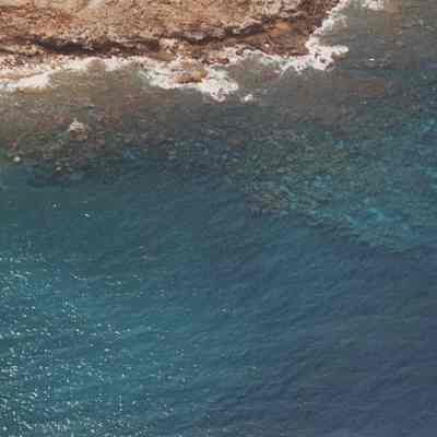 Aerial view of coral reef and northern coastline