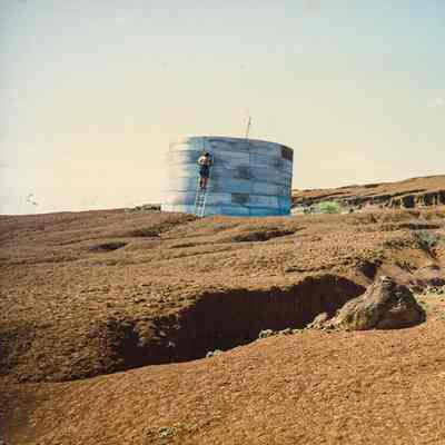 Person working at water catchment