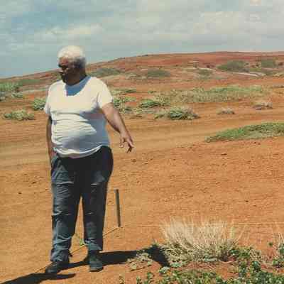 Rene Sylva pointing to planting