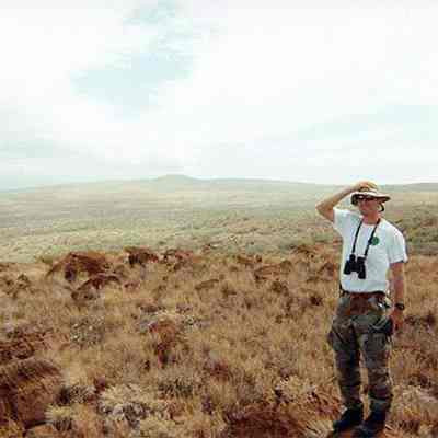 Unidentified man standing in unidentified area