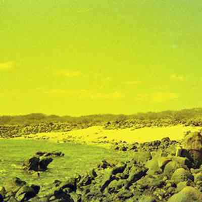 Rocky coastline and white sand beach