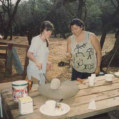 Women preparing possible construction materials