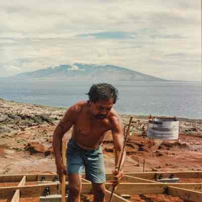 Man working on wooden frame