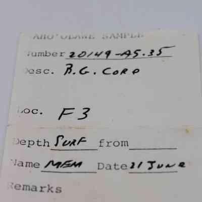 Artifact slip for basaltic glass core: This image depicts an artifact slip with sample details including number, description, location, depth, collector's name, and the date.