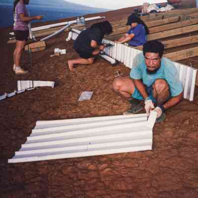 People constructing structure base