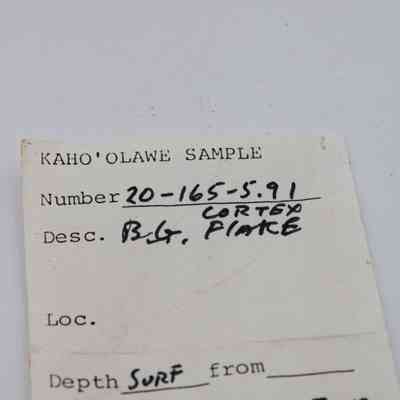 Artifact slip for basaltic glass flake: The image shows a sample label from Kahoʻolawe with details such as sample number, description, date, and collector's name.