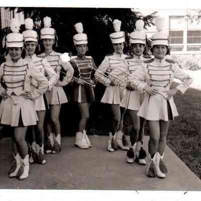 The 1959 HHS Majorettes: (L to R) Carolyn Cole, Nickey Sims, Sharon Rue, Leonna Russell, Nancy Rogers, Billie Jo Bonta, and Gloria Bailey
