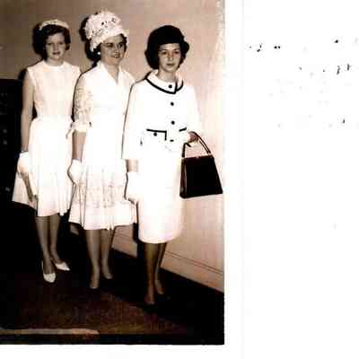 Modeling clothing from local stores in 1963 are (L to R) Julie Keightley, Mrs. Gene Royalty, and Mrs. R.M. Winston Jr.