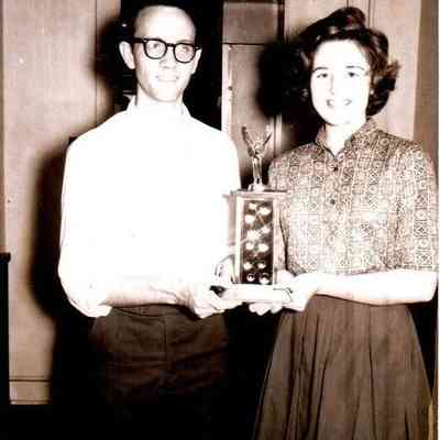 Fomer Harrodsburg High School Debate partners Pat Shewmaker and David Cornelius show their 1962 Trophy. (Aug 1962)
