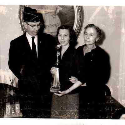 Pictured (L to R) Henry Hensley, Sandra Alexander, and Mrs. Bess Williams. Williams won her 2nd State legion Oratorical title in a row and the 5th in 5 years. (March 1959)