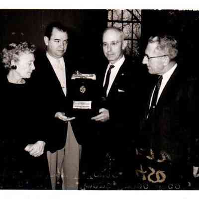 Pictured (l to r) are Bess Williams, Principle William Smart, Brune Jacob, and Superintendent Andrew F. Young. Jacob is with the National Forensic League and was presenting the Leading Chapter Award (Dec 1959)