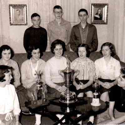 This trophy from the National Forensic League was won by the hard work of HHS students. Pictured (l to r) are in front are Sandra Alexander and Betty Patrick. The other girls are Janet Graham, Kathy Sims, Donna Freeman, Polly Cherry, and Carol Rowland. The boys are Duane Reynolds, James Price Royalty, and Ronnie Elliott. (March 1959)