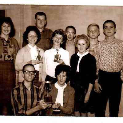 Pictured (l to r) in the front row are David Cornelius and Dixie Moore. The second row includes Kathy Vansant, Marilyn Graham, Dianne Smalley, Ann Hatchett, and Chris Trower. The back row features Jim Chris Burns, Jimmy Noel, and Bill VanArsdall. (Nov 1962)