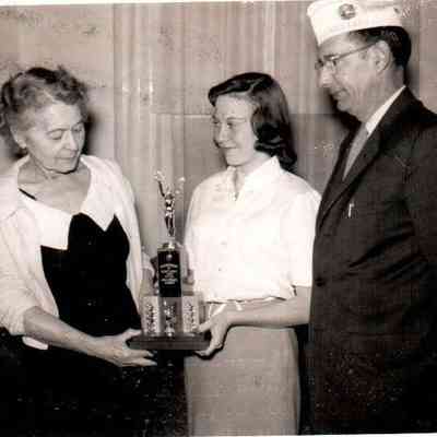 Sandra Alexander (center) wins the State American Legion Oratorical contest, bringing the prize home to Harrodsburg for the 4th consecutive year. The gentleman in the photo is American legion Area B Vice Commander Henry C. Hensley (March 1958)